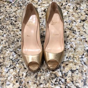 Gold peep toe Christian Louboutin pumps